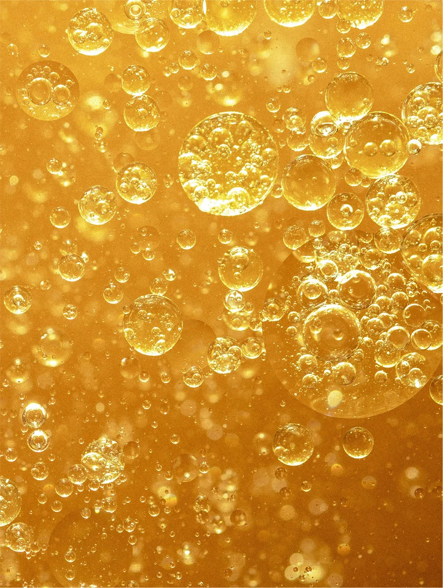 Close-up on oil drops in the water.