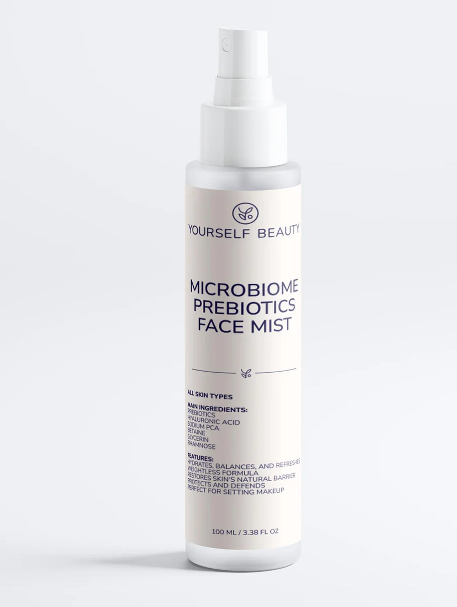 Bottle of 'Yourself Beauty' microbiome prebiotics face mist on a white background.