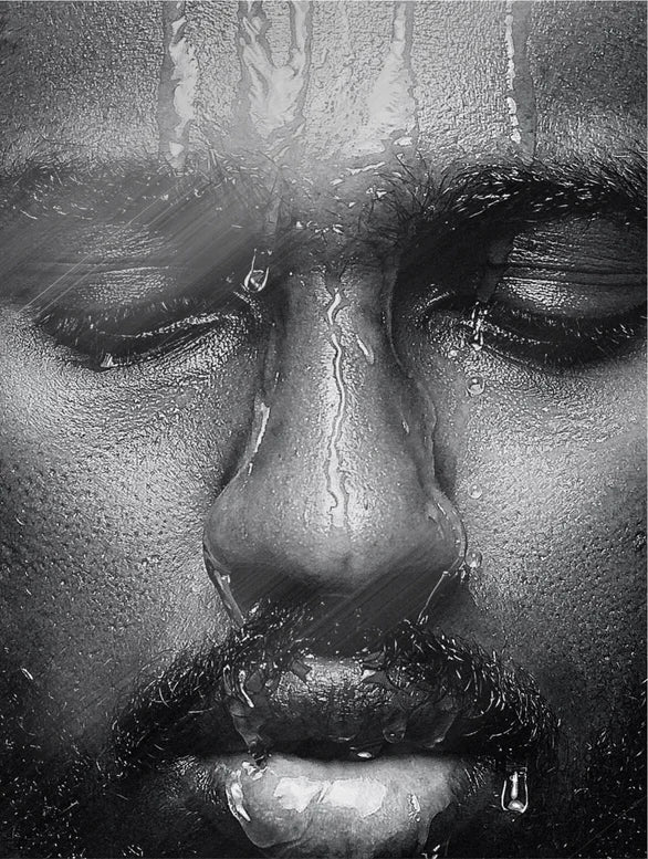 Water dripping over a man face.