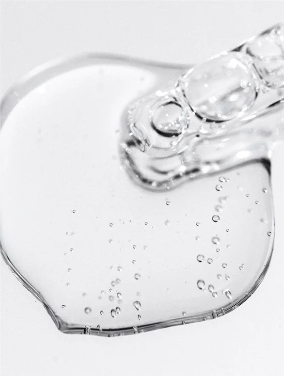Close-up on jelly serum with dropper.