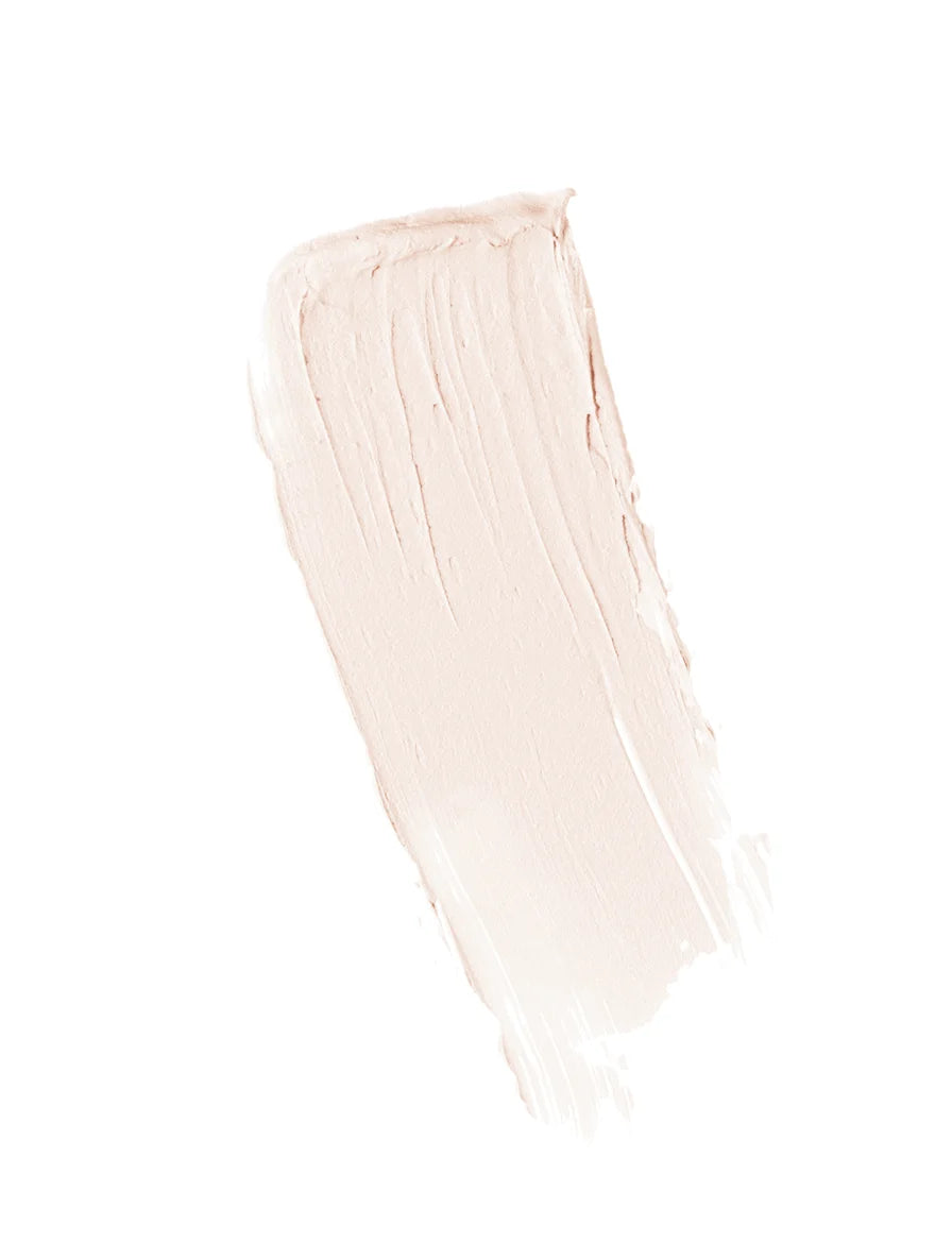 Mineral sunscreen texture on white background.