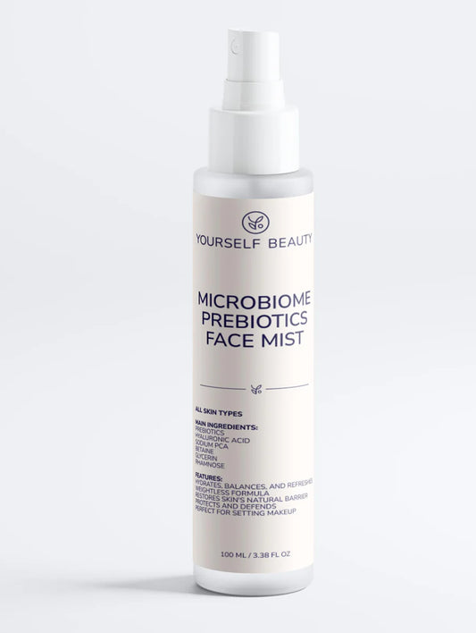 Bottle of 'Yourself Beauty' microbiome prebiotics face mist on a white background.