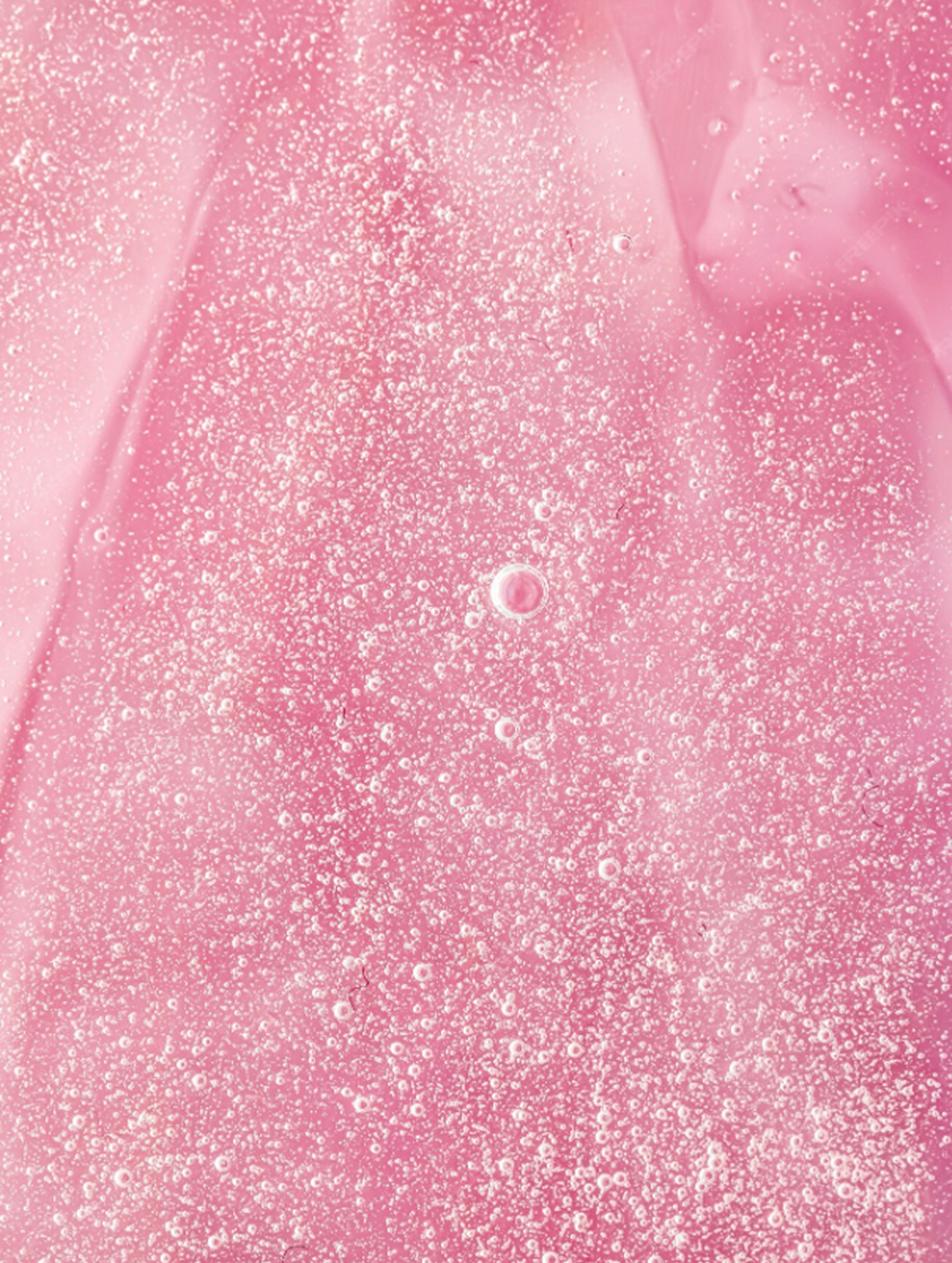 Close-up of pink gel with glitter texture