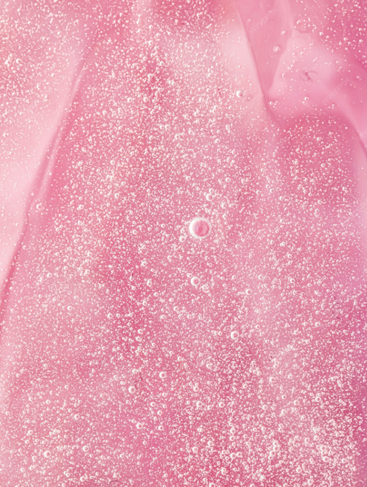 Close-up of pink gel with glitter texture