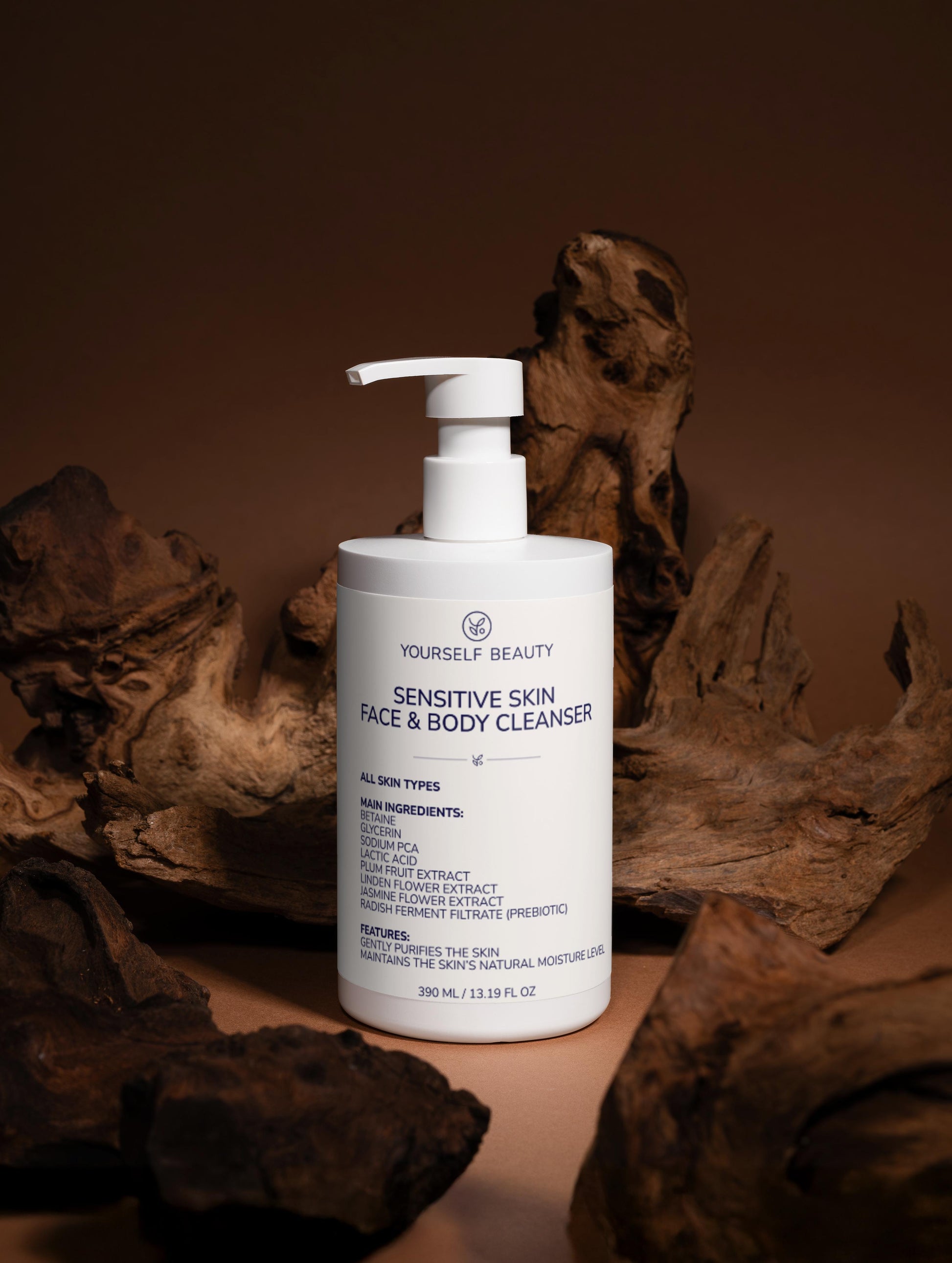 Yourself Beauty Sensitive skin face and body cleanser bottle with natural wood background